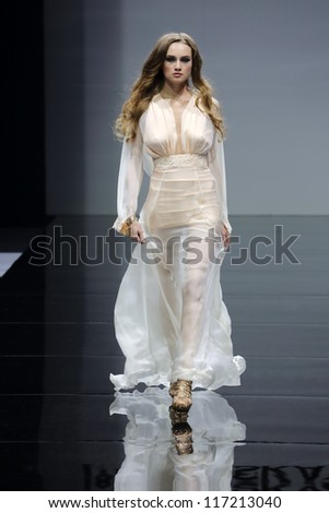 MOSCOW - OCTOBER 26: Model on podium during show of Olesya Malinskaya. Collection as part of  Volvo Fashion Week, on October 26, 2012, Moscow, Russia