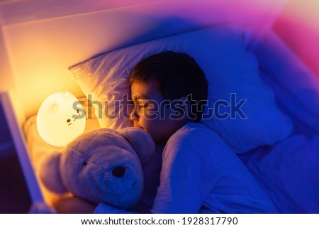 Similar – Image, Stock Photo Tired boy and cat sleeping on bed