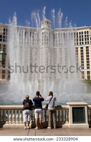Las Vegas, Nevada, USA - Sept. 22, 2014:Tourist enjoying the famous fountain water show at the Bellagio Hotel and Casino in Las Vegas, Nevada on Sept. 22, 2014.