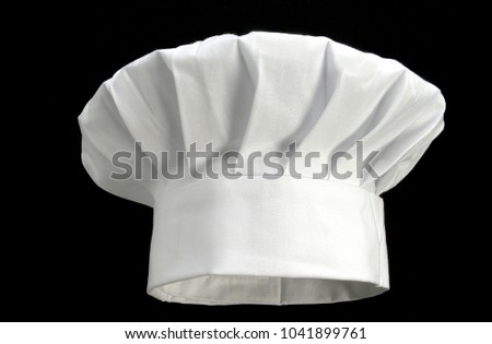 white chef's hat on black Foto stock © 
