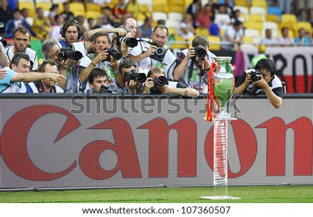KYIV, UKRAINE - JULY 1: Photographers take pictures of UEFA EURO 2012 Football Trophy (Cup) during final game between Spain and Italy at NSC Olympic stadium on July 1, 2012 in Kyiv, Ukraine