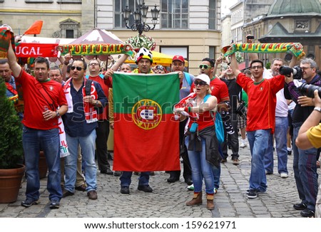 LVIV, UKRAINE - 9 JUNE: Portugal football team supporters walk on a streets of Lviv city before UEFA EURO 2012 game against Germany on 9 June, 2012 in Lviv, Ukraine