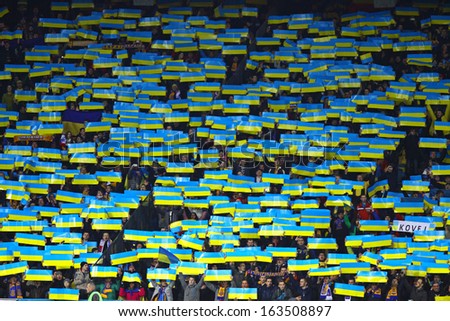 KYIV, UKRAINE - NOVEMBER 15: Ukraine national football team supporters show their support during FIFA World Cup 2014 qualifier game against France on November 15, 2013 in Kyiv, Ukraine