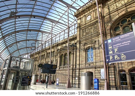 STRASBOURG, FRANCE - MAY 6, 2013: Gare de Strasbourg, the main railway station of Strasbourg city, Alsace region, France. View of original building under the modern glass canopy