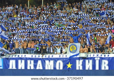 KIEV, UKRAINE - SEPTEMBER 16: Dynamo Kiev football team supporters show their support during UEFA Champions League game against Rubin Kazan on Sep. 16, 2009 in Kiev