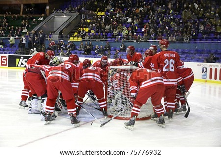 KYIV, UKRAINE - APRIL 20: Poland players cheer each other up during IIHF Ice-hockey World Championship DIV I Group B game against Ukraine on April 20, 2011 in Kyiv, Ukraine