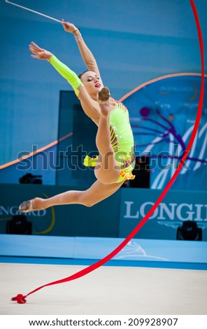 KYIV, UKRAINE - AUGUST 30, 2013: Ganna Rizatdinova of Ukraine performs during 32nd Rhythmic Gymnastics World Championship (Individual All-Around competition)