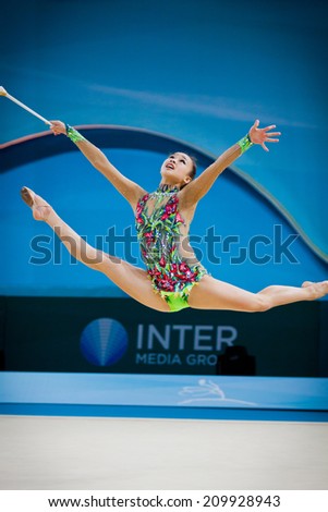 KYIV, UKRAINE - AUGUST 30, 2013: Senyue Deng of China performs during 32nd Rhythmic Gymnastics World Championship (Individual All-Around competition)