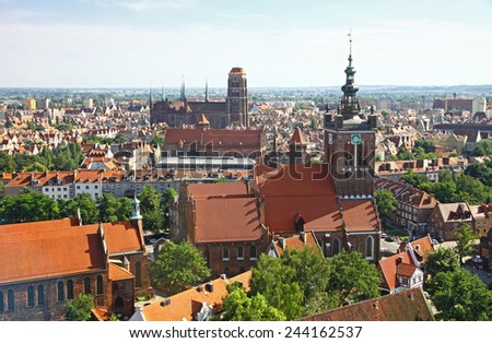 Bird eye view of St. Catherine Church, St. Mary Church and roofs of Gdansk city centre, Poland
