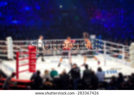 Blurred boxing fight. Abstract sports background with bokeh