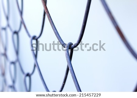 rusty iron wire fence