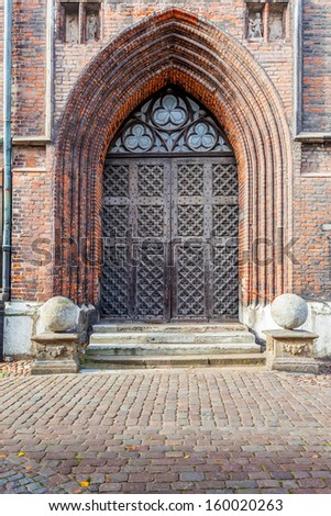 The side door to the St. Mary\'s Basilica in Gdansk, Poland.