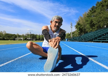 Similar – Image, Stock Photo Flexible man training on aerial straps