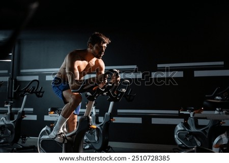 Similar – Image, Stock Photo shirtless caucasian young man wearing turquoise shorts in a park in summer