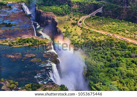 Rainbow over Victoria Falls in Zimbabwe, sunny day in Africa ストックフォト © 
