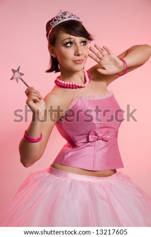 The beautiful fairy on a pink background