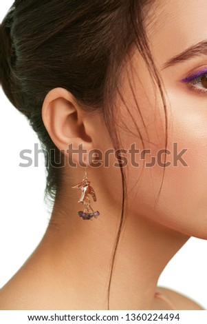 Similar – Image, Stock Photo Young Woman Tying Back Hair and Smiling in Bathroom