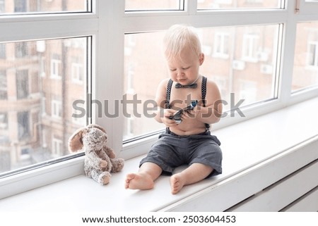 Similar – Image, Stock Photo smiling boy dressed as Joker on dark background