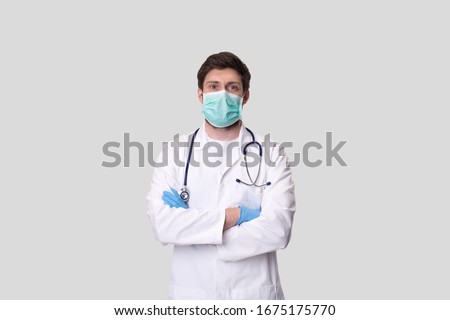 Similar – Image, Stock Photo doctor man wearing protective mask and gloves indoors. Holding an alcohol gel or antibacterial disinfectant. Hygiene and corona virus concept. Covid-19