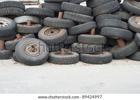 Stack of Old Worn Tires for Recycling