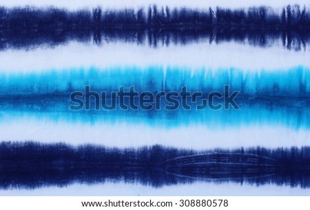 striped tie dyed pattern on cotton fabric abstract background.