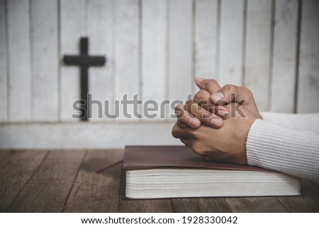 Religious young woman praying to God in the morning, spirtuality and religion, Religious concepts
