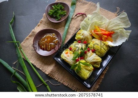 cabbage rolls stuffed  meat.
 kol gulung, kelem dolmasi, sarma Cabbage wraps,  Chou farci, golubtsy, golabki.
cooked cabbage leaves wrapped with meat, or beef.
 Zdjęcia stock © 