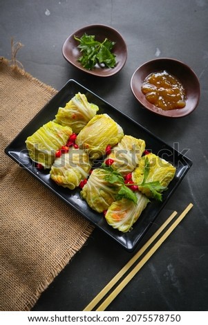 cabbage rolls stuffed  meat.
 kol gulung, kelem dolmasi, sarma Cabbage wraps,  Chou farci, golubtsy, golabki.
cooked cabbage leaves wrapped with meat, or beef.
 Zdjęcia stock © 