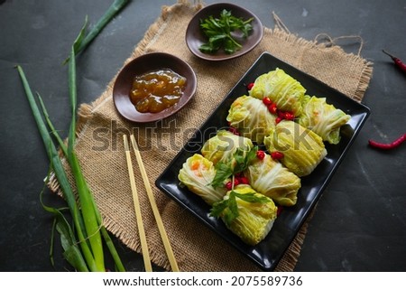 cabbage rolls stuffed  meat or kol gulung, kelem dolmasi, sarma Cabbage wraps,  Chou farci, golubtsy, golabki.
cooked cabbage leaves wrapped with meat, or beef. 
 Zdjęcia stock © 
