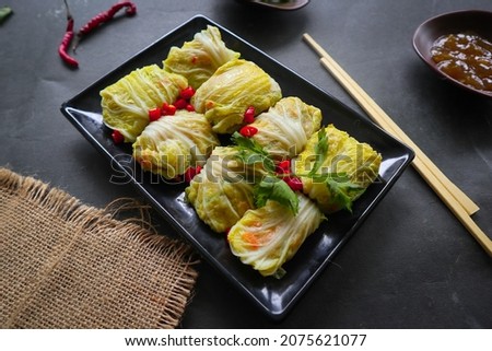 
'cabbage rolls stuffed  meat or kol gulung, kelem dolmasi, sarma Cabbage wraps,  Chou farci, golubtsy, golabki.
cooked cabbage leaves wrapped with meat, or beef.
 Zdjęcia stock © 