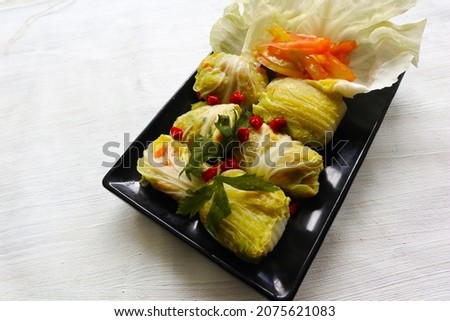 'cabbage rolls stuffed  meat or kol gulung, kelem dolmasi, sarma Cabbage wraps,  Chou farci, golubtsy, golabki.
cooked cabbage leaves wrapped with meat, or beef.
 Zdjęcia stock © 