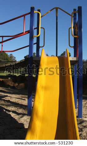 Playground equipment - yellow slide