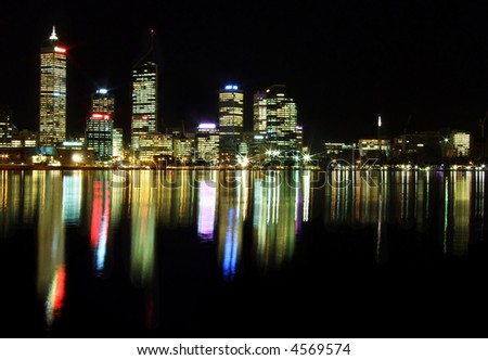 Perth City at night with reflections mirrored in the Swan River