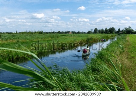 Similar – Foto Bild Paddeltour ins Blaue Kanal