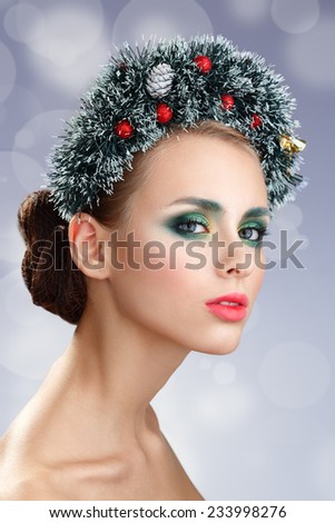 Beauty Christmas Girl. Beautiful Christmas wreath. New Year.