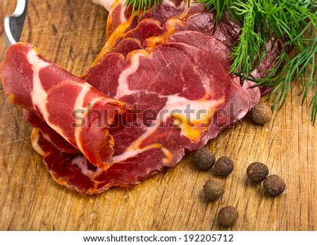 simple farm bacon, stranded on a fork . Focus area increased by folding multiple photos