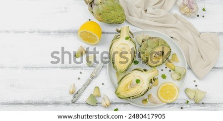 Similar – Image, Stock Photo Fresh green artichokes at the weekly market in Alacati in the province of Izmir at the Aegean Sea in Turkey