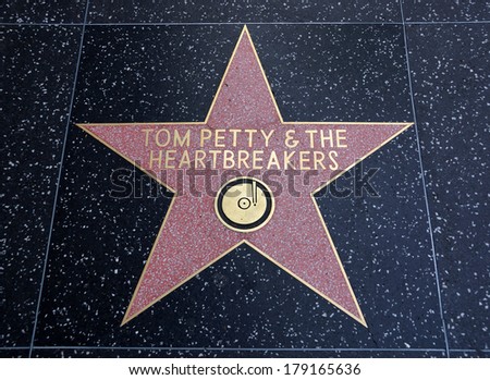 HOLLYWOOD - JANUARY 23: Tom Petty & the Heartbreakers star on Hollywood Walk of Fame on January 23, 2014 in Hollywood, California. This star is located on Hollywood Blvd. one of 2400 celebrity stars.