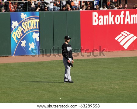 SAN FRANCISCO, CA - JULY 28: Giants Vs. Marlins: Marlins Cody Ross stands in the outfield between plays on July 28, 2010 at AT&T Park San Francisco California.