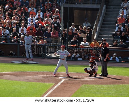 SAN FRANCISCO, CA - OCTOBER 19: Giants vs. Phillies: Chase Utley stands into the batters box with Buster Posey squatting as catcher NLCS 2010 taken October 19, 2010 AT&T Park San Francisco.