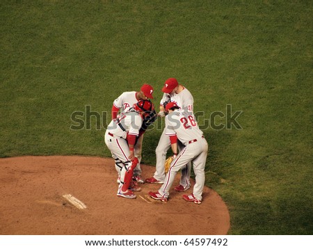 SAN FRANCISCO, CA - OCTOBER 20: Phillies infield talks with pitcher Ryan Madson on the mounds game 4 of the 2010 NLCS game between Giants and Phillies Oct. 20, 2010 AT&T Park San Francisco, CA.