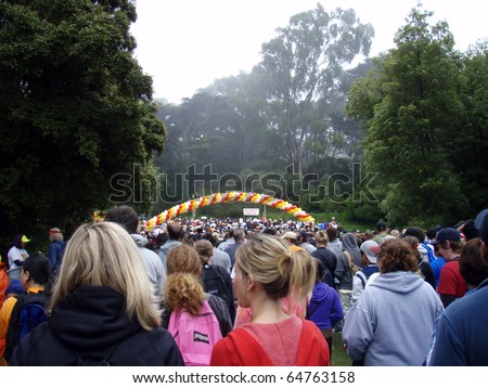 SAN FRANCISCO - JULY 15: long line of people participating to the AIDS Walk 2007 walking down into Golden Gate Park on July 15, 2007 in San Francisco.