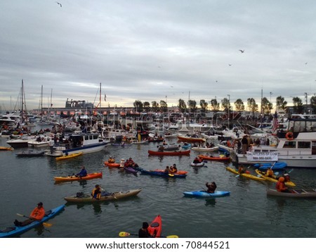 SAN FRANCISCO, CA - OCTOBER 27: McCovey Cove filled with boats and people as birds fly over head during game 1 of the 2010 World Series Oct. 27, 2010 AT&T Park San Francisco, CA.