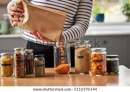 Similar – Image, Stock Photo filled storage jars on the shelf