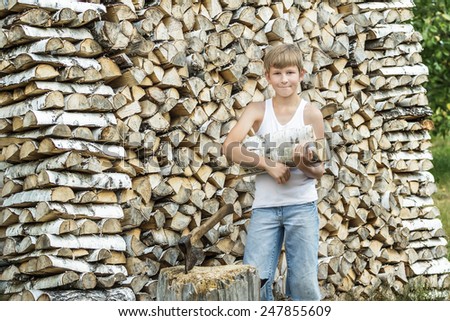 Teenage timberjack harvester at his work at local farm
