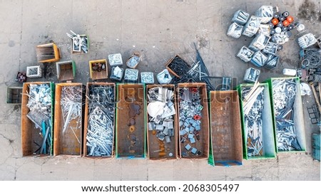 Containers from a height with different types of metal, Sorting for remelting metal products Foto d'archivio © 