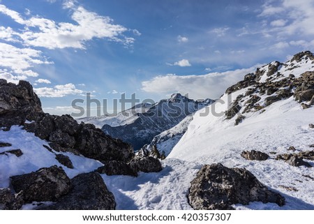 Similar – Image, Stock Photo Rocky mountains with clouds