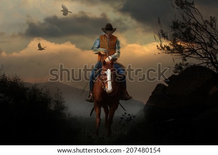 A cowboy riding a horse in the mountains with clouds, crows and tree branches.