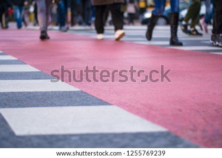 Crowd of people walking on zebra crossing street city center Stock fotó © 