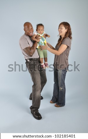 http://image.shutterstock.com/display_pic_with_logo/193822/102185401/stock-photo-asian-wife-african-american-husband-at-play-with-their-mixed-race-infant-girl-102185401.jpg